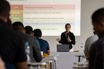U.S. Missouri National Guard Chief Warrant Officer 3 Katie Herrel, the cyber operations chief for the Missouri National Guard, speaks during a cybersecurity subject matter expert exchange with local government members in Panama City, Panama, July 22, 2025. The training brought together a diverse group of agencies, including the Ministry of Public Security, the Panama Canal Authority, and other national emergency services.