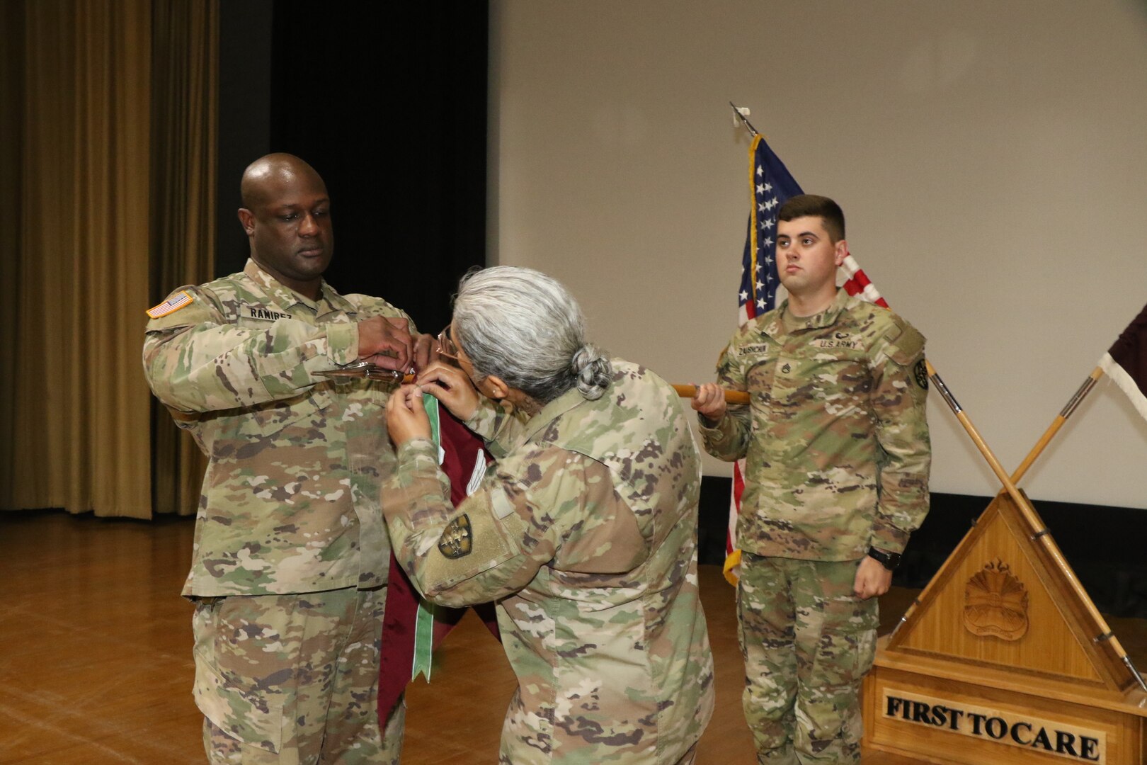 Phot of Army Reserves Medical Command during a transfer of authority ceremony in Stayton Theater.