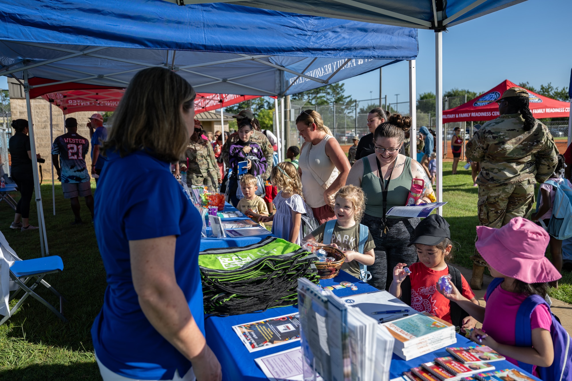 Backpacks were distributed at a BACKpack-to-school Bash.
