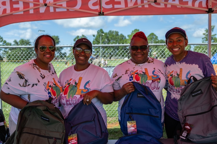 Backpacks were distributed at a BACKpack-to-school Bash.