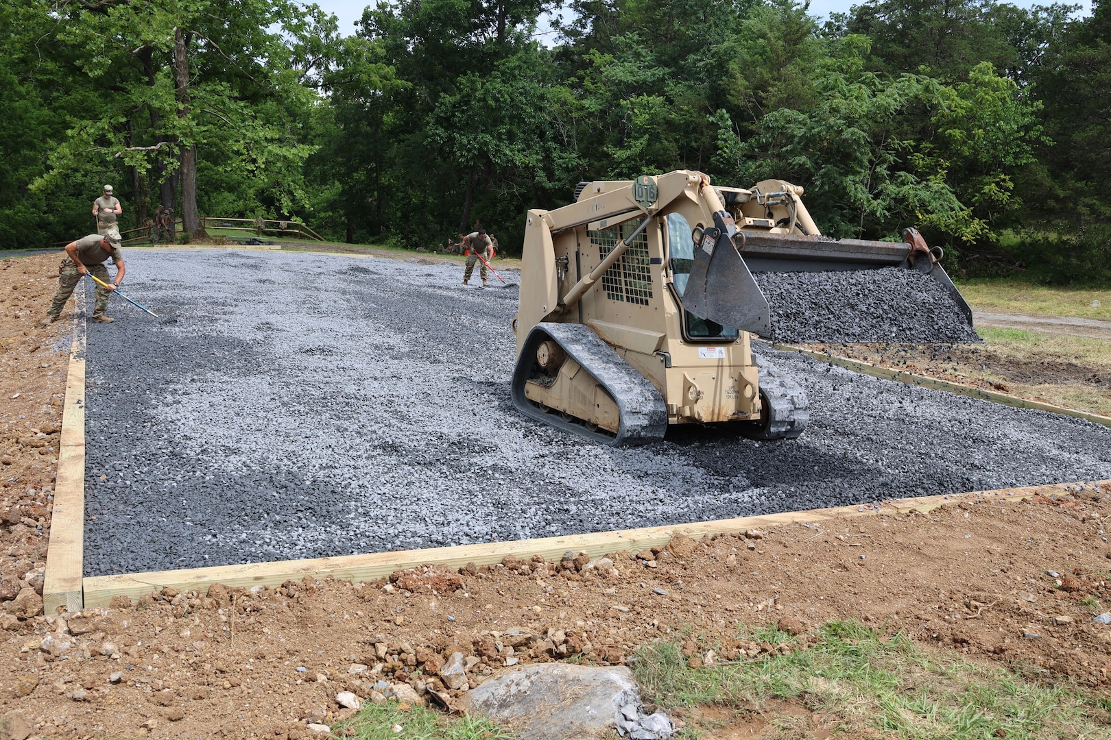 Virginia National Guard leaders from the state, brigade and battalion level visit Soldiers assigned to the Cedar Bluff-based 1033rd Engineer Support Company, 276th Engineer Battalion, 329th Regional Support Group constructing a parking area and walking trail July 21, 2025, at the Cedar Creek & Belle Grove National Historical Park in Middletown, Virginia. The leaders met with U.S. National Park rangers, learned more about the project and the park, thanked Soldiers for their service and presented challenge coins to recognize outstanding duty performance. The project is part of the Innovative Readiness Training program where engineers put their military skills to work on community service projects approved by National Guard Bureau.