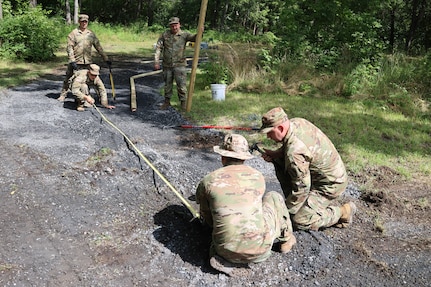 Virginia National Guard leaders from the state, brigade and battalion level visit Soldiers assigned to the Cedar Bluff-based 1033rd Engineer Support Company, 276th Engineer Battalion, 329th Regional Support Group constructing a parking area and walking trail July 21, 2025, at the Cedar Creek & Belle Grove National Historical Park in Middletown, Virginia. The leaders met with U.S. National Park rangers, learned more about the project and the park, thanked Soldiers for their service and presented challenge coins to recognize outstanding duty performance. The project is part of the Innovative Readiness Training program where engineers put their military skills to work on community service projects approved by National Guard Bureau.