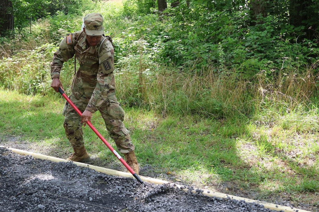 Virginia National Guard leaders from the state, brigade and battalion level visit Soldiers assigned to the Cedar Bluff-based 1033rd Engineer Support Company, 276th Engineer Battalion, 329th Regional Support Group constructing a parking area and walking trail July 21, 2025, at the Cedar Creek & Belle Grove National Historical Park in Middletown, Virginia. The leaders met with U.S. National Park rangers, learned more about the project and the park, thanked Soldiers for their service and presented challenge coins to recognize outstanding duty performance. The project is part of the Innovative Readiness Training program where engineers put their military skills to work on community service projects approved by National Guard Bureau.
