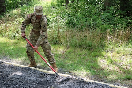 Virginia National Guard leaders from the state, brigade and battalion level visit Soldiers assigned to the Cedar Bluff-based 1033rd Engineer Support Company, 276th Engineer Battalion, 329th Regional Support Group constructing a parking area and walking trail July 21, 2025, at the Cedar Creek & Belle Grove National Historical Park in Middletown, Virginia. The leaders met with U.S. National Park rangers, learned more about the project and the park, thanked Soldiers for their service and presented challenge coins to recognize outstanding duty performance. The project is part of the Innovative Readiness Training program where engineers put their military skills to work on community service projects approved by National Guard Bureau.
