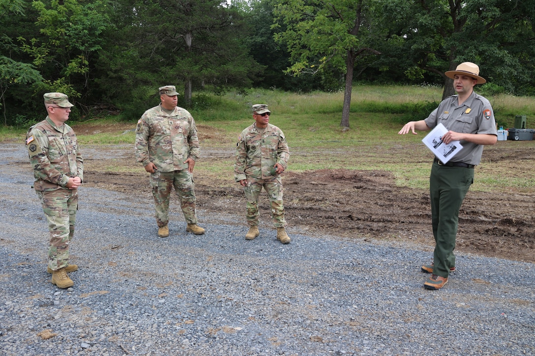 Virginia National Guard leaders from the state, brigade and battalion level visit Soldiers assigned to the Cedar Bluff-based 1033rd Engineer Support Company, 276th Engineer Battalion, 329th Regional Support Group constructing a parking area and walking trail July 21, 2025, at the Cedar Creek & Belle Grove National Historical Park in Middletown, Virginia. The leaders met with U.S. National Park rangers, learned more about the project and the park, thanked Soldiers for their service and presented challenge coins to recognize outstanding duty performance. The project is part of the Innovative Readiness Training program where engineers put their military skills to work on community service projects approved by National Guard Bureau.