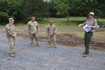 Virginia National Guard leaders from the state, brigade and battalion level visit Soldiers assigned to the Cedar Bluff-based 1033rd Engineer Support Company, 276th Engineer Battalion, 329th Regional Support Group constructing a parking area and walking trail July 21, 2025, at the Cedar Creek & Belle Grove National Historical Park in Middletown, Virginia. The leaders met with U.S. National Park rangers, learned more about the project and the park, thanked Soldiers for their service and presented challenge coins to recognize outstanding duty performance. The project is part of the Innovative Readiness Training program where engineers put their military skills to work on community service projects approved by National Guard Bureau.