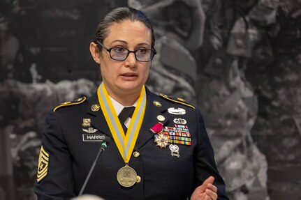 Sgt. Maj. Julie D. Harris, U.S. Army Financial Management Command Operations senior enlisted advisor, delivers remarks during her retirement ceremony at the Maj. Gen. Emmett J. Bean Federal Center in Indianapolis Nov. 25, 2024. Harris retired from the U.S. Army after more than 22 years of service. (U.S. Army photo by Mark R. W. Orders-Woempner)