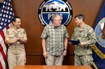 Capt. JD Crinklaw, commander, PSNS & IMF, and Cmdr. Andrew Ra, commander, USS Connecticut (SSN 22), present Earnest T. Ryan Jr., marine machinery supervisor, Shop 38, Marine Machinist, with the NCSC Medal May 28. (U.S. Navy photo by Wendy Hallmark)