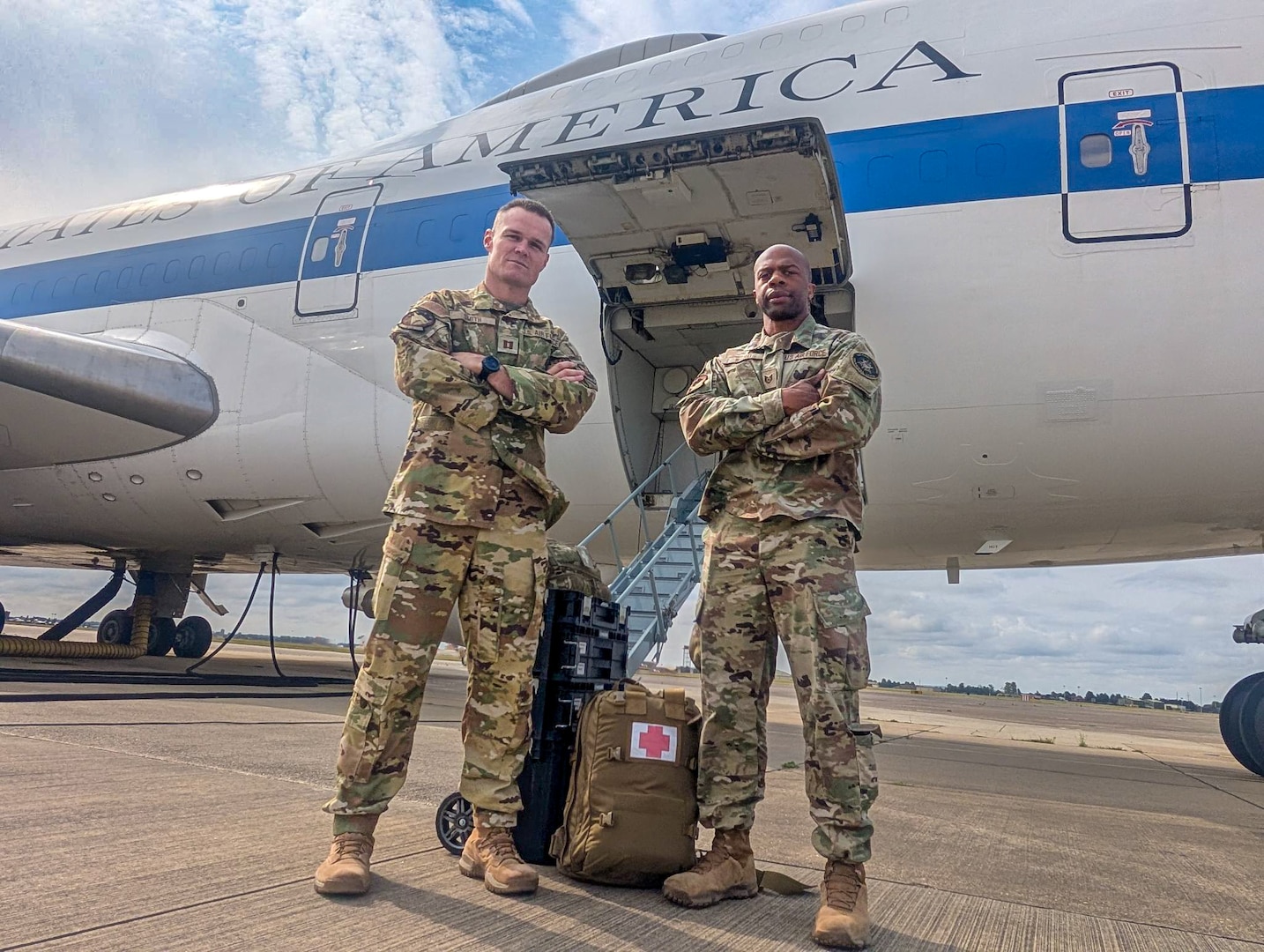 Image of two Airmen posing for a photo.