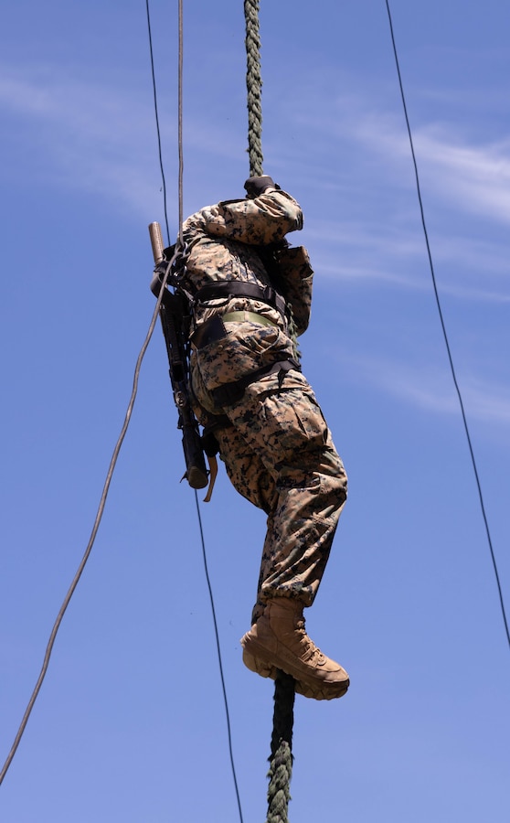 U.S. Marine Corps Cpl. Baily Kittrell, a rifleman with Golf Company, 2nd Battalion, 23rd Marines, forward deployed with 4th Marine Regiment, 3d Marine Division as part of the Unit Deployment Program, conducts a vertical rope descent during the Korean Marine Exercise Program 25.2 in Pohang, South Korea, July 24, 2025. KMEP is conducted regularly between the ROK and U.S. Marine Corps to increase their combined capabilities through realistic training geared towards deterrence and maintaining peace in the Indo-Pacific. Kittrell is a native of Alabama.  (U.S. Marine Corps photo by Cpl. Kanoa Thomas)