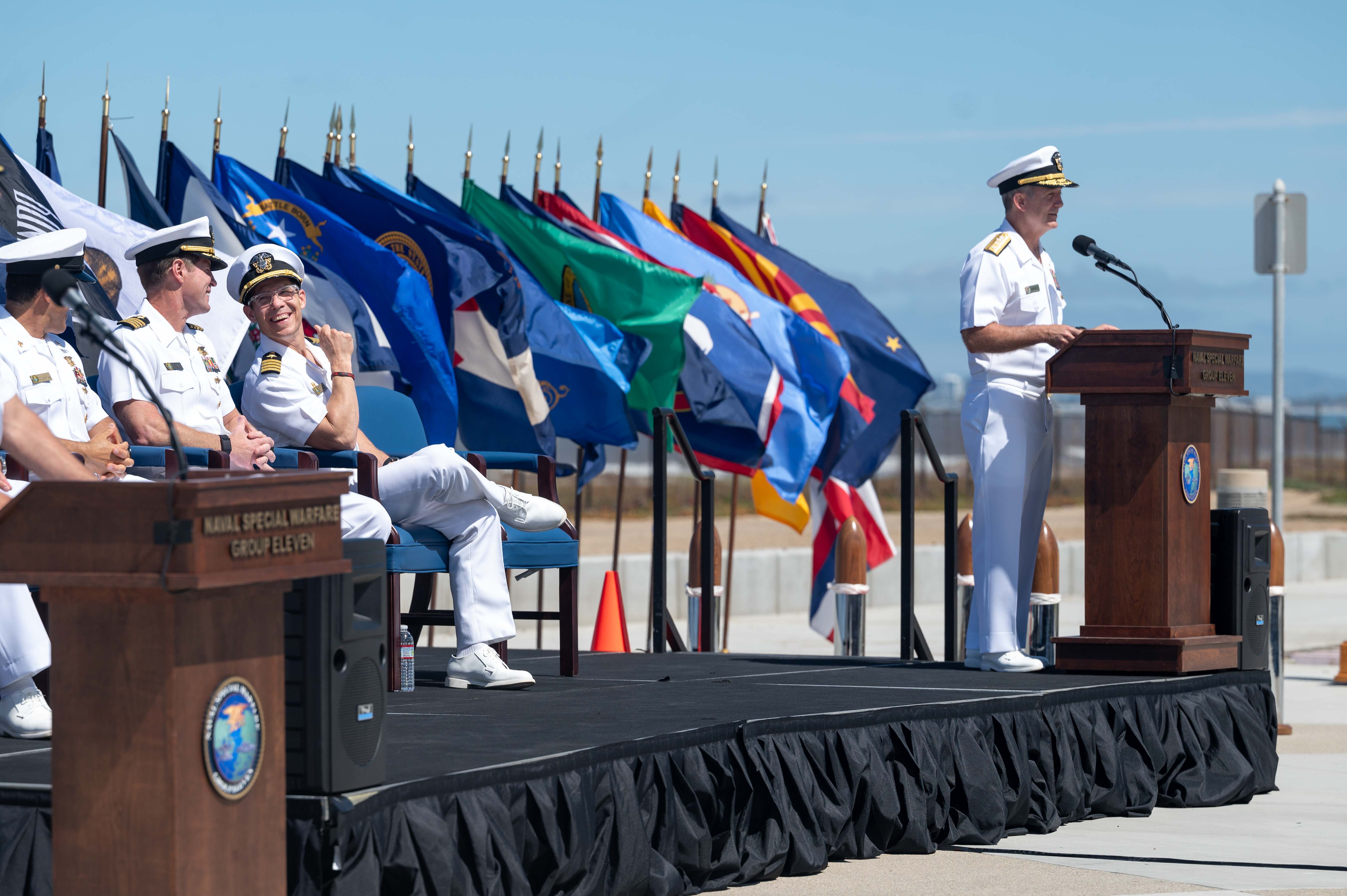 Capt. Christopher E. Wear salutes Capt. Stephen M. Healey as Healey assumes command of Naval Special Warfare Group (NSWG) 11 during a ceremony presided over by Rear Adm. Milton J. Sands III, commander, Naval Special Warfare Command. NSWG-11, a component of U.S. Naval Special Warfare Command, is composed of Navy Reserve SEAL and SWCC units.