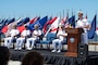 Capt. Christopher E. Wear salutes Capt. Stephen M. Healey as Healey assumes command of Naval Special Warfare Group (NSWG) 11 during a ceremony presided over by Rear Adm. Milton J. Sands III, commander, Naval Special Warfare Command. NSWG-11, a component of U.S. Naval Special Warfare Command, is composed of Navy Reserve SEAL and SWCC units.