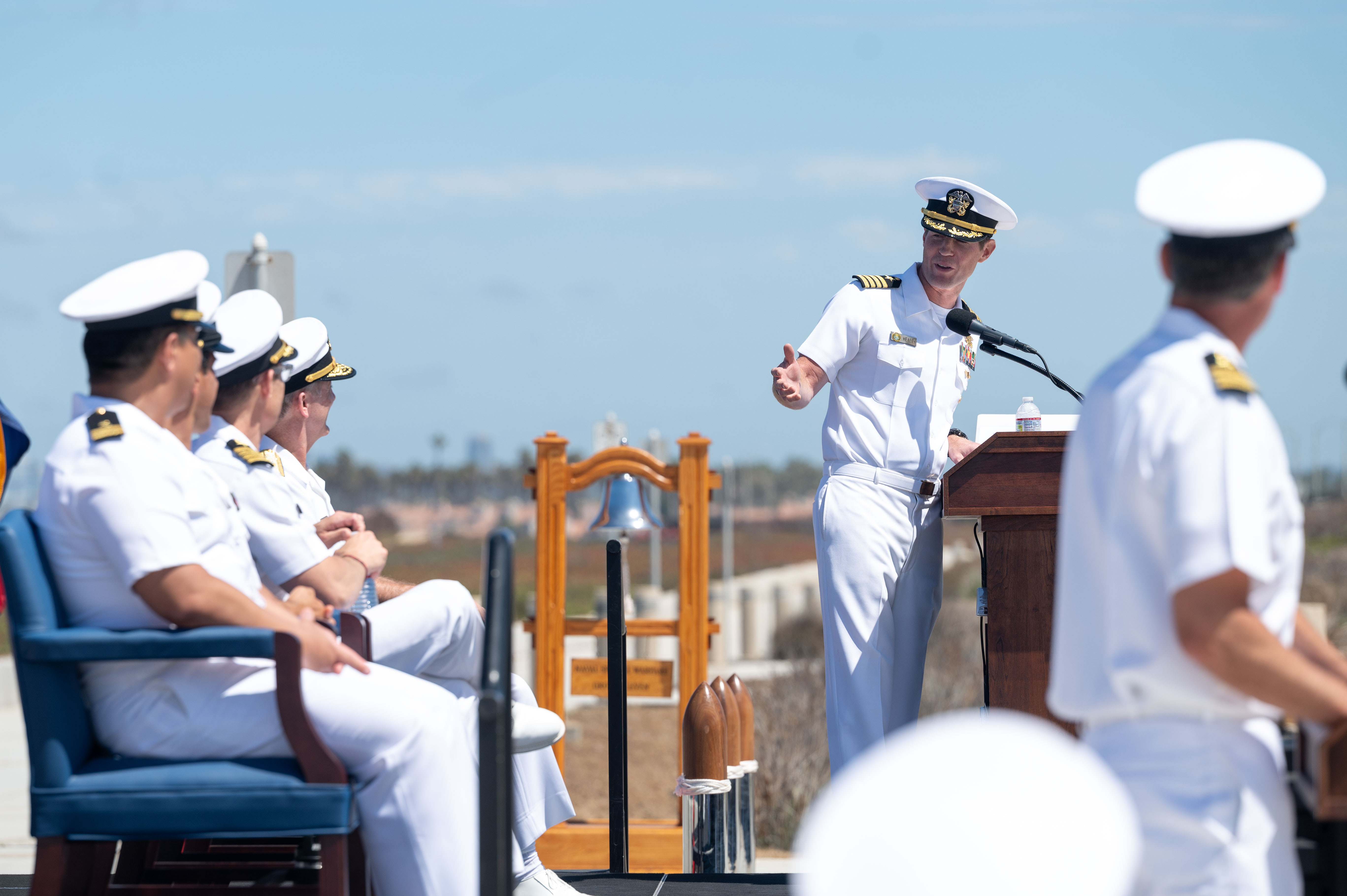 Capt. Christopher E. Wear salutes Capt. Stephen M. Healey as Healey assumes command of Naval Special Warfare Group (NSWG) 11 during a ceremony presided over by Rear Adm. Milton J. Sands III, commander, Naval Special Warfare Command. NSWG-11, a component of U.S. Naval Special Warfare Command, is composed of Navy Reserve SEAL and SWCC units.