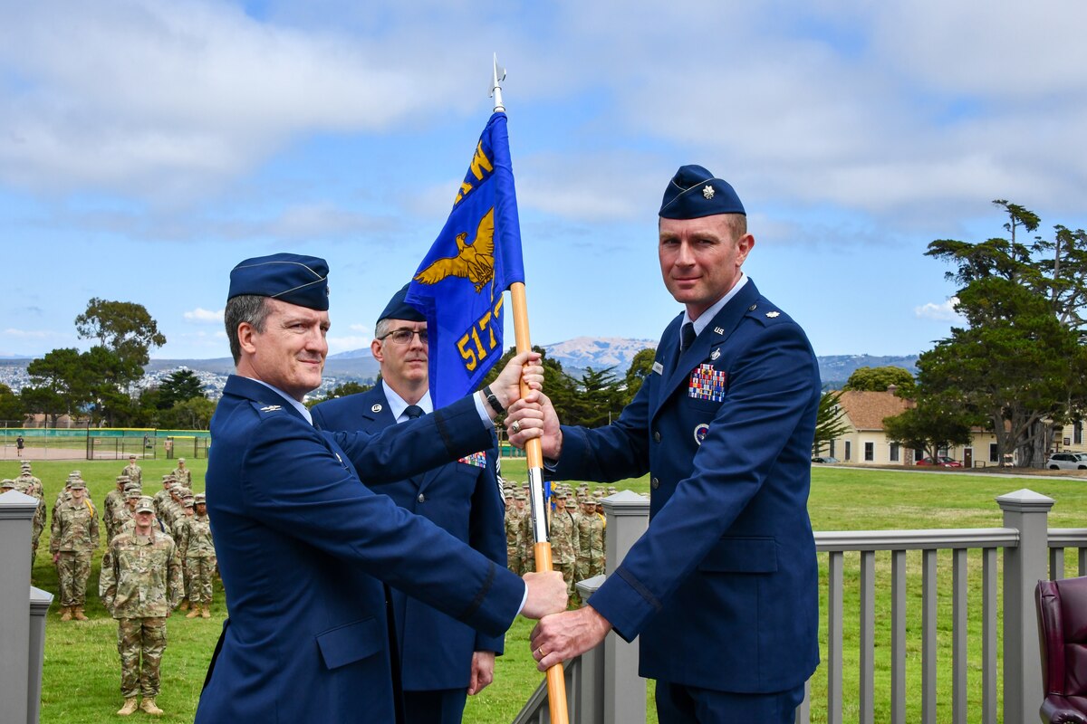 U.S. Air Force Col. Jason Guyette, 517th Training Group commander, passed the guidon to Lt. Col. Kevin Hawkins, incoming 314th training Squadron commander, at the assumption of command ceremony at Soldiers Field, Presidio of Monterey, California, July 25. As commander, Hawkins will lead the squadron in shaping linguists ready to support global intelligence and national security missions across the Department of Defense. (Courtesy photo)