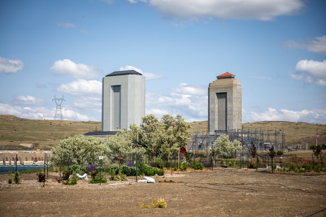The U.S. Army Corps of Engineers, Omaha District’s Fort Peck Project powerhouses sit behind the project’s upcoming Bee Haven Pollinator Garden and Interpretive Trail in Montana, June 21, 2025.