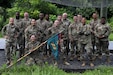 U.S. Soldiers assigned to the 109th Mobile Public Affairs Detachment, 213th Regional Support Group, Pennsylvania National Guard, pose for a group photo at Fort Indiantown Gap, Pennsylvania, July 22, 2025. The 109th MPAD executed an obstacle course to evaluate their fitness and learn about Air Assault training. (U.S. Army National Guard photo by Pfc. Leah Klunk and Pfc. Ciarra Munoz)