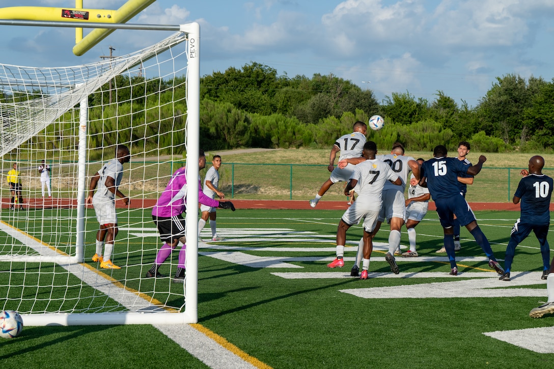 U.S. Army Capt. Christian King (#17) takes the header over Navy during the Armed Forces Men’s Soccer Championship in Phantom Warrior Stadium, Fort Hood, Texas, on July 28, 2025. Each team faces off in a bracket to determine which service will hold the championship title, featuring teams from the Army, Navy, and Air Force. (U.S. Army photo by Sgt. Tien Dat Ngo)