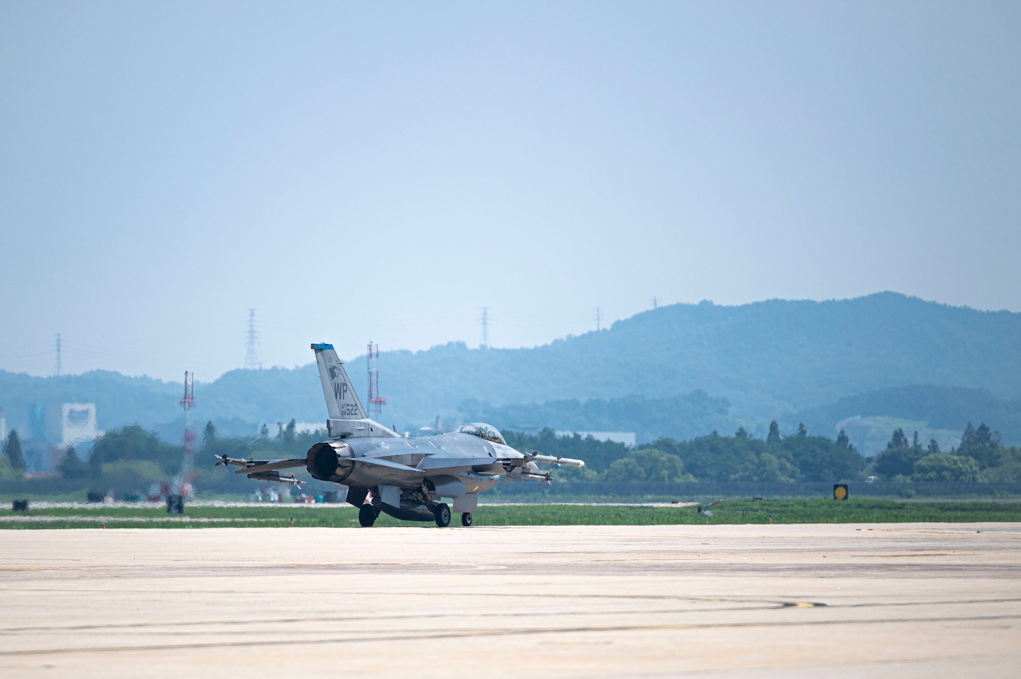 A U.S. Air Force F-16 Fighting Falcon lands at Osan Air Base, Republic of Korea, July 28, 2025, during a strategic relocation from Kunsan Air Base.