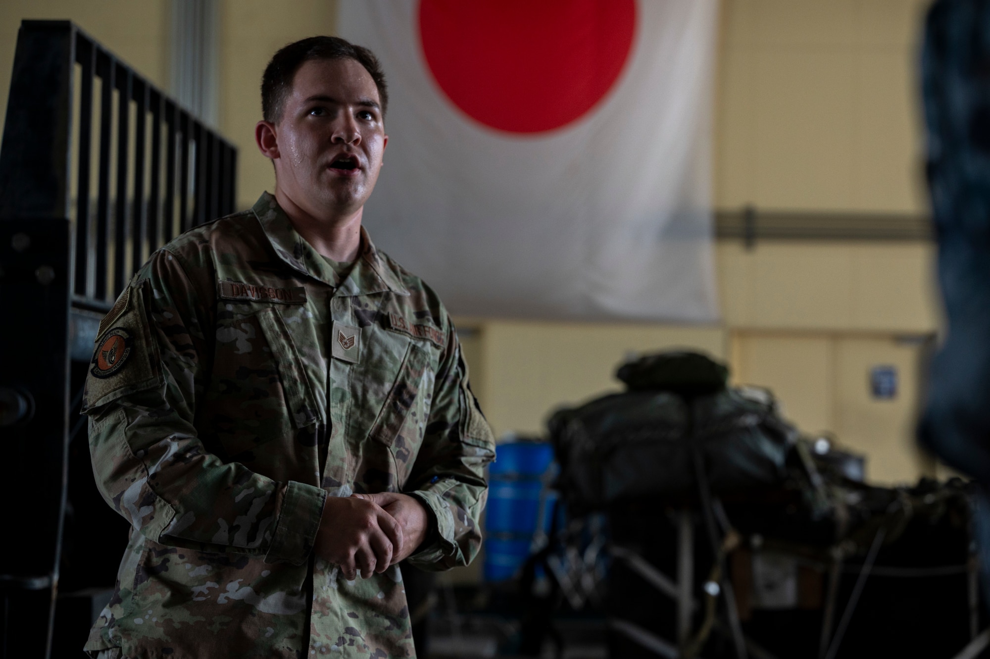 A U.S. Air Force member speaks during a training.
