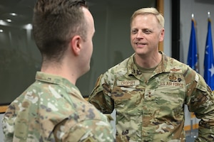 Maj. Gen. Luke Cropsey unveils his new strategic anchors for the Program Executive Office for Command, Control, Communications and Battle Management here, July 30, 2025. The initiative addresses three critical requirements: create credibility and responsiveness with operational partners, develop a comprehensive DAF BATTLE NETWORK-wide technical strategy, and expand “lethal enablers” to overcome bureaucratic obstacles slowing down delivery. Cropsey is C3BM’s program executive officer. (Official Air Force Photo by Richard Blumenstein).