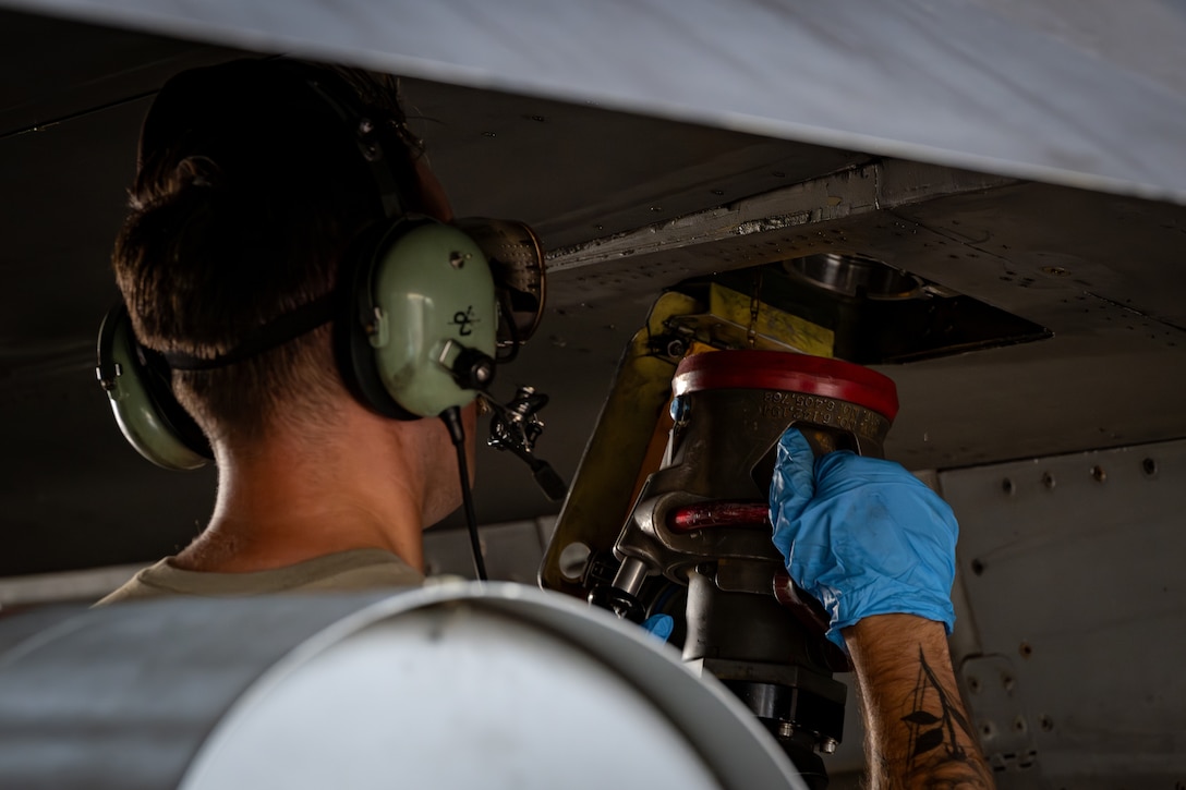 U.S. Air Force Senior Airman Kevin Wood, 14th Fighter Generation Squadron crew chief, unhooks a fuel line from a 14th Fighter SquadronF-16C Fighting Falcon  during a hot pit refueling as part of exercise Resolute Force Pacific  2025