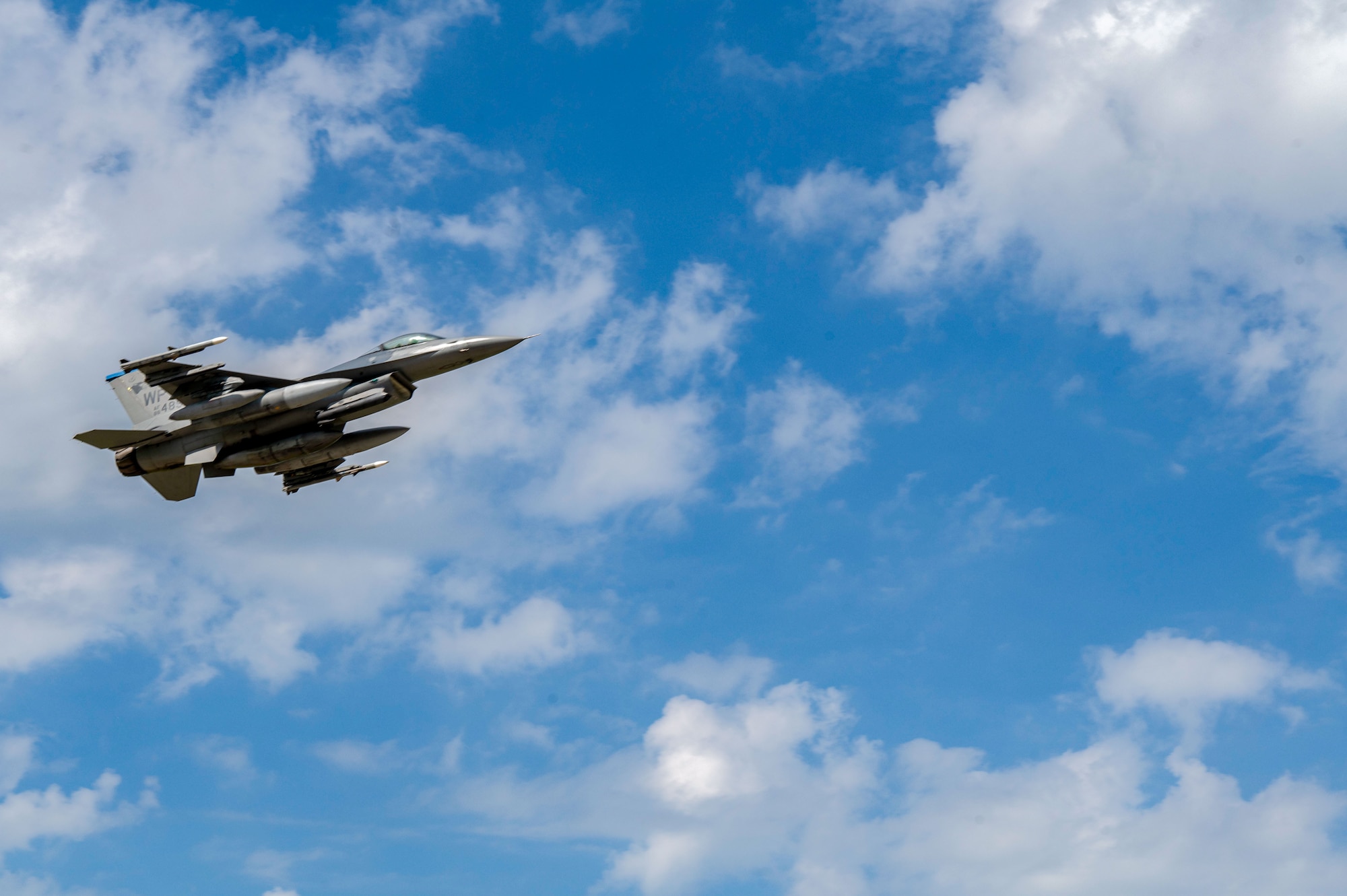 An F-16 Fighting Falcon aircraft takes off