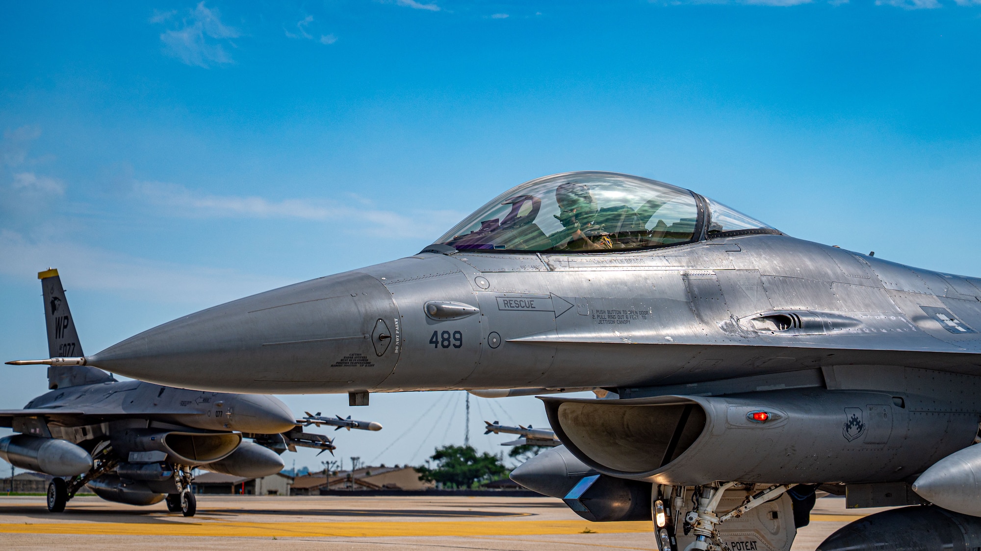 A jet sits on the runway
