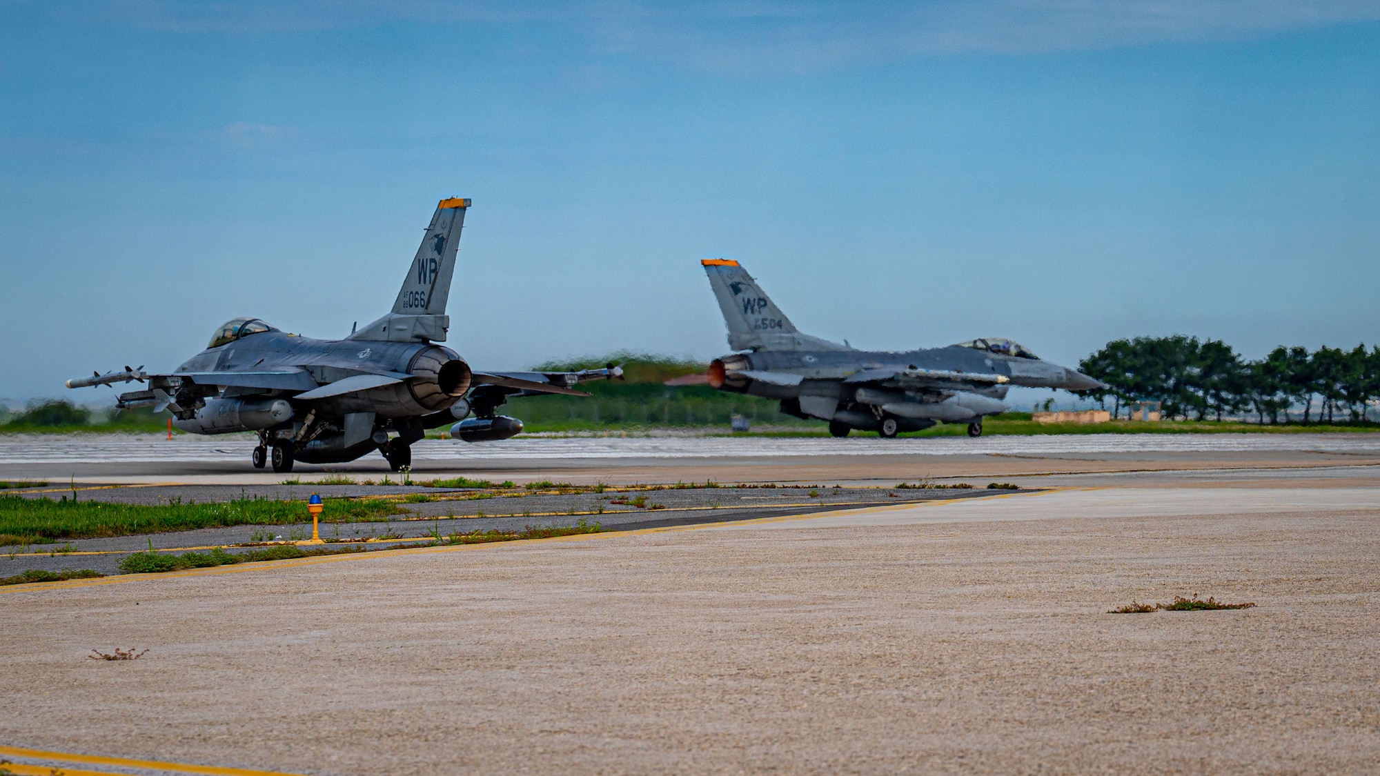 Two jets get ready to take off