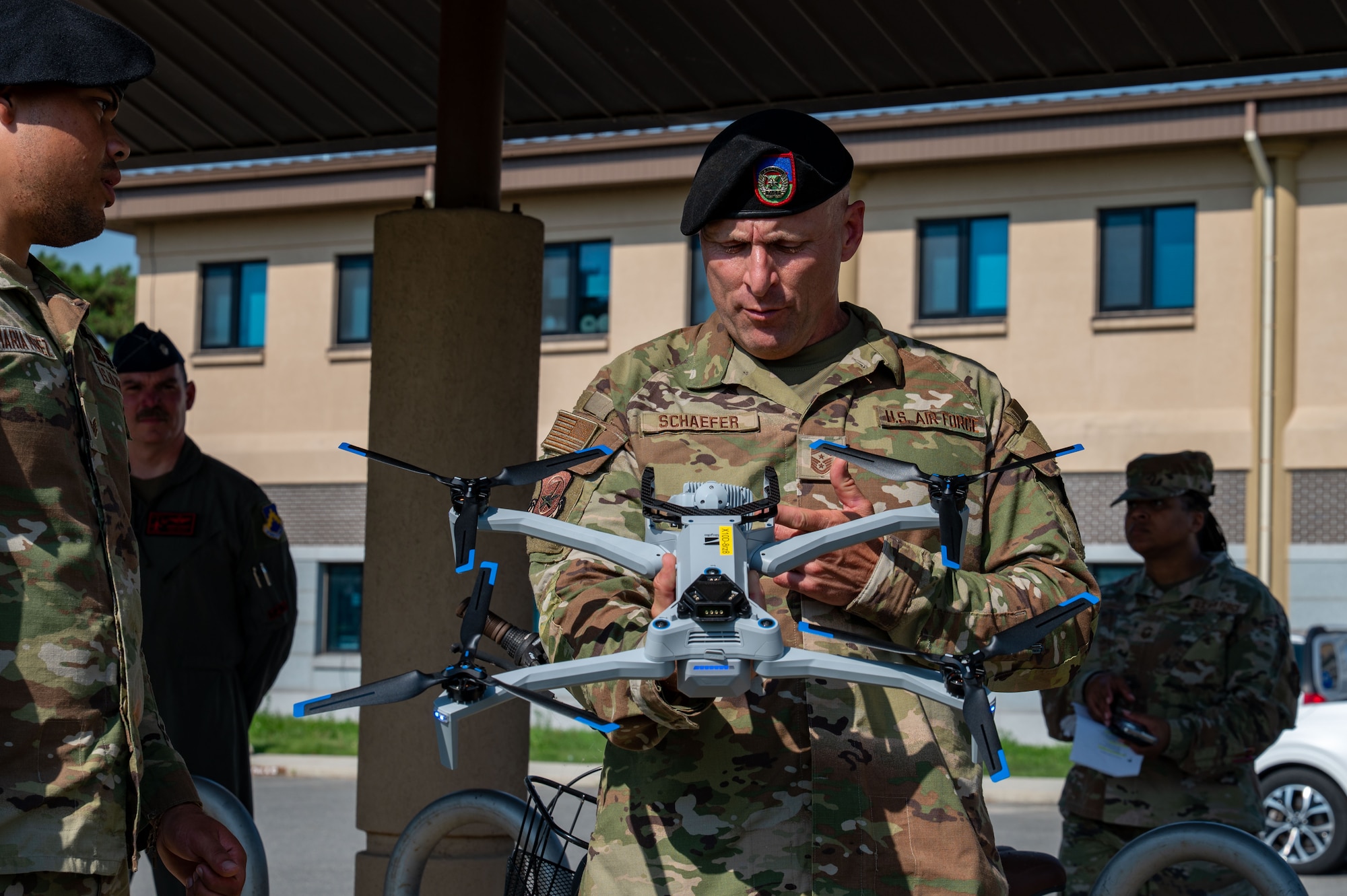 Chief Master Sgt. Thomas Schaefer II, Seventh Air Force command chief, inspects an 8th Security Forces Squadron drone at Kunsan Air Base, Republic of Korea, July 29, 2025. Schaefer’s multi-day visit included leadership briefings, lunch discussions, unit immersion demonstrations and an all-call.