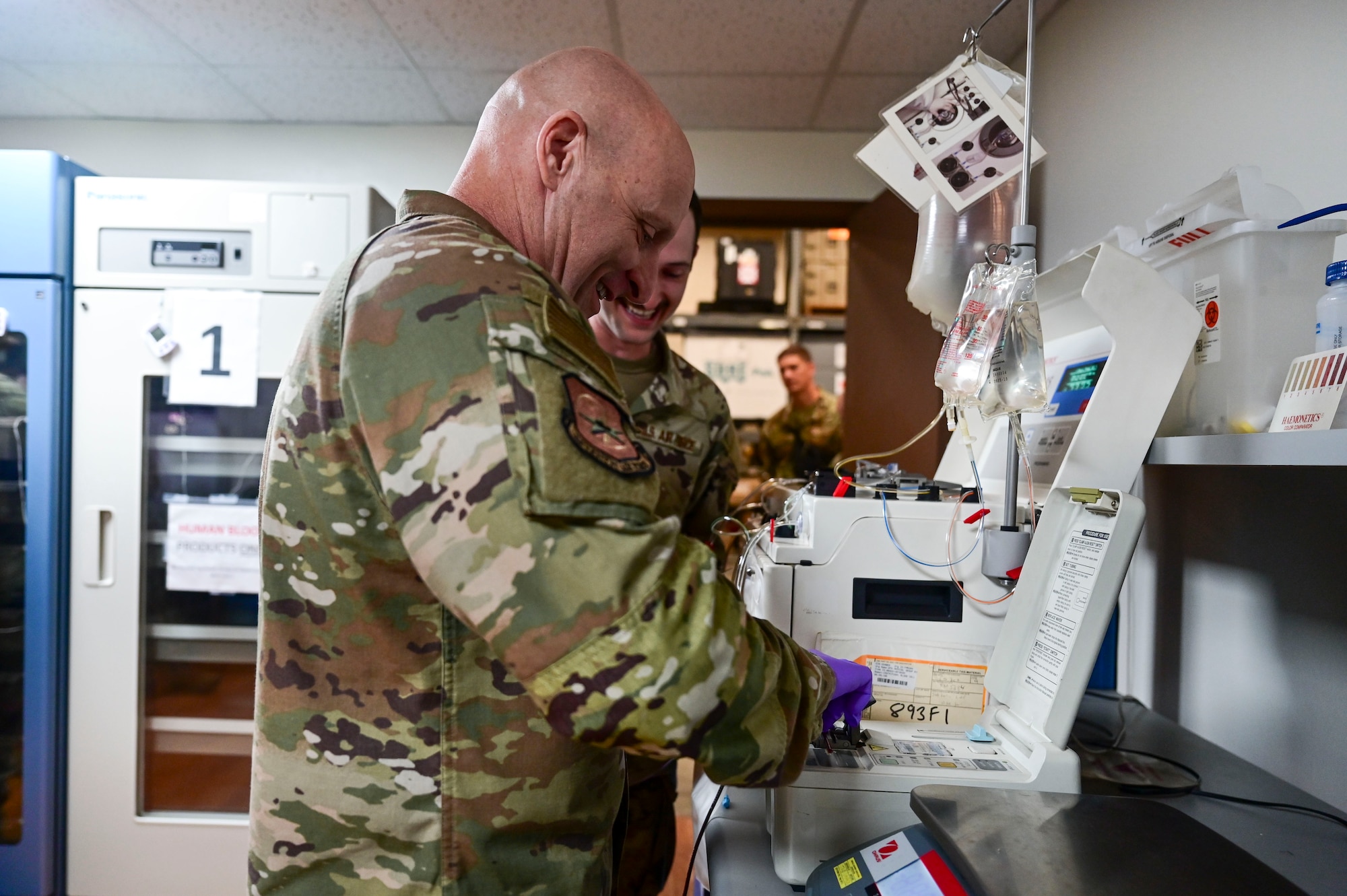 Chief Master Sgt. Thomas Schaefer II, Seventh Air Force command chief, uses a haemonetic blood machine to process blood at Kunsan Air Base, Republic of Korea, July 29, 2025. The 8th Medical Group explained to leadership how to process blood donations to decontaminate them and how this capability relates to the 8th Fighter Wing’s readiness.