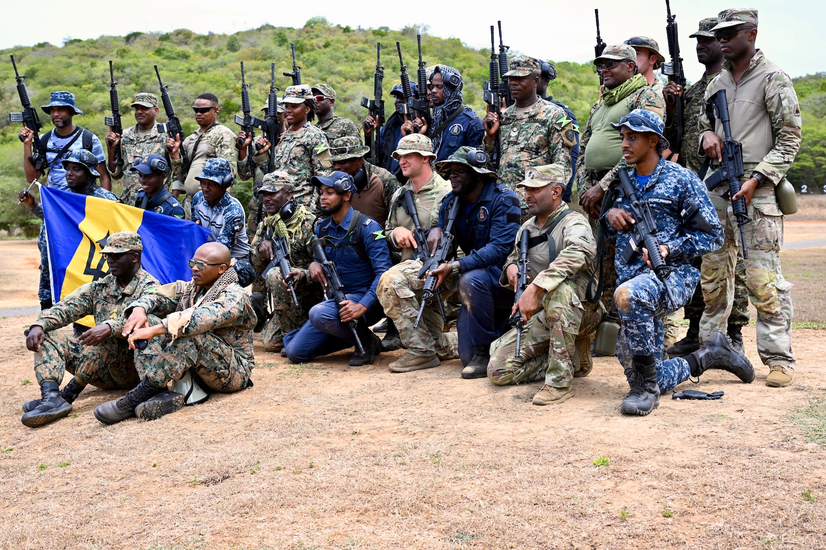 Soldiers from the D.C. National Guard, Barbados Defence Force Reserves, Jamaica Defence Force, and Jamaica National Reserve hone marksmanship skills at Twickenham Park Range in St. Catherine, Jamaica, on July 17, 2025. As part of the Caribbean Regional Training Camp, activities included zeroing, firing from different positions, march-and-shoot practice, and a march-and-shoot competition. The District of Columbia National Guard's (DCNG) partnership with Jamaica, facilitated by the U.S. National Guard Bureau's State Partnership Program (SPP), promotes security cooperation through military engagements and interagency collaboration.