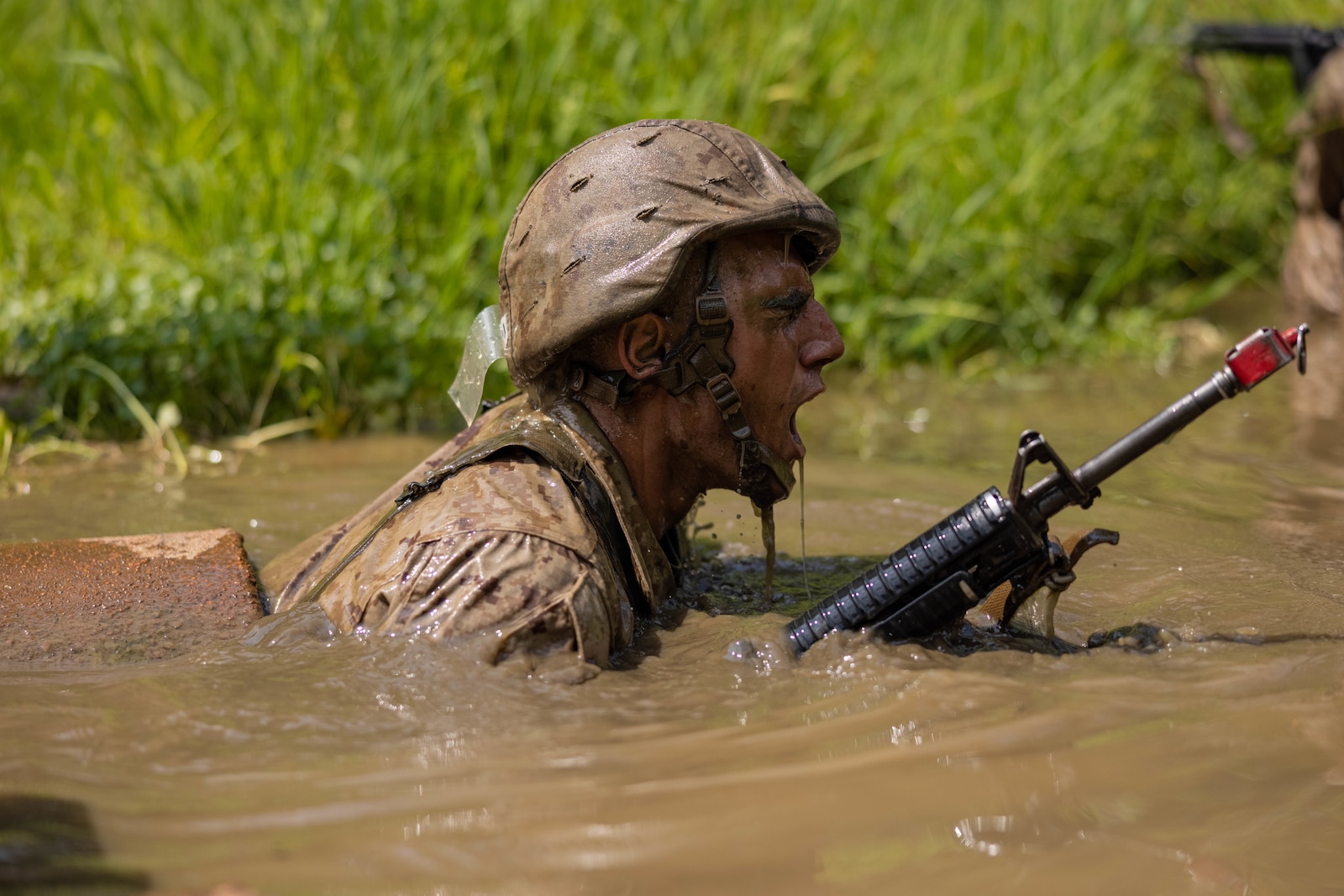 A U.S. Marine Corps officer candidate traverses “The Quigley” during the Forge at Officer Candidate School, on Marine Corps Base Quantico, Virginia, July 23, 2025. The Forge is a culminating event designed to test candidates’ endurance, leadership and resilience under pressure involving day and night hikes, simulated indirect fire, sleep deprivation, obstacle navigation and team-based exercises. (U.S. Marine Corps photo by Sgt. Dean Gurule)