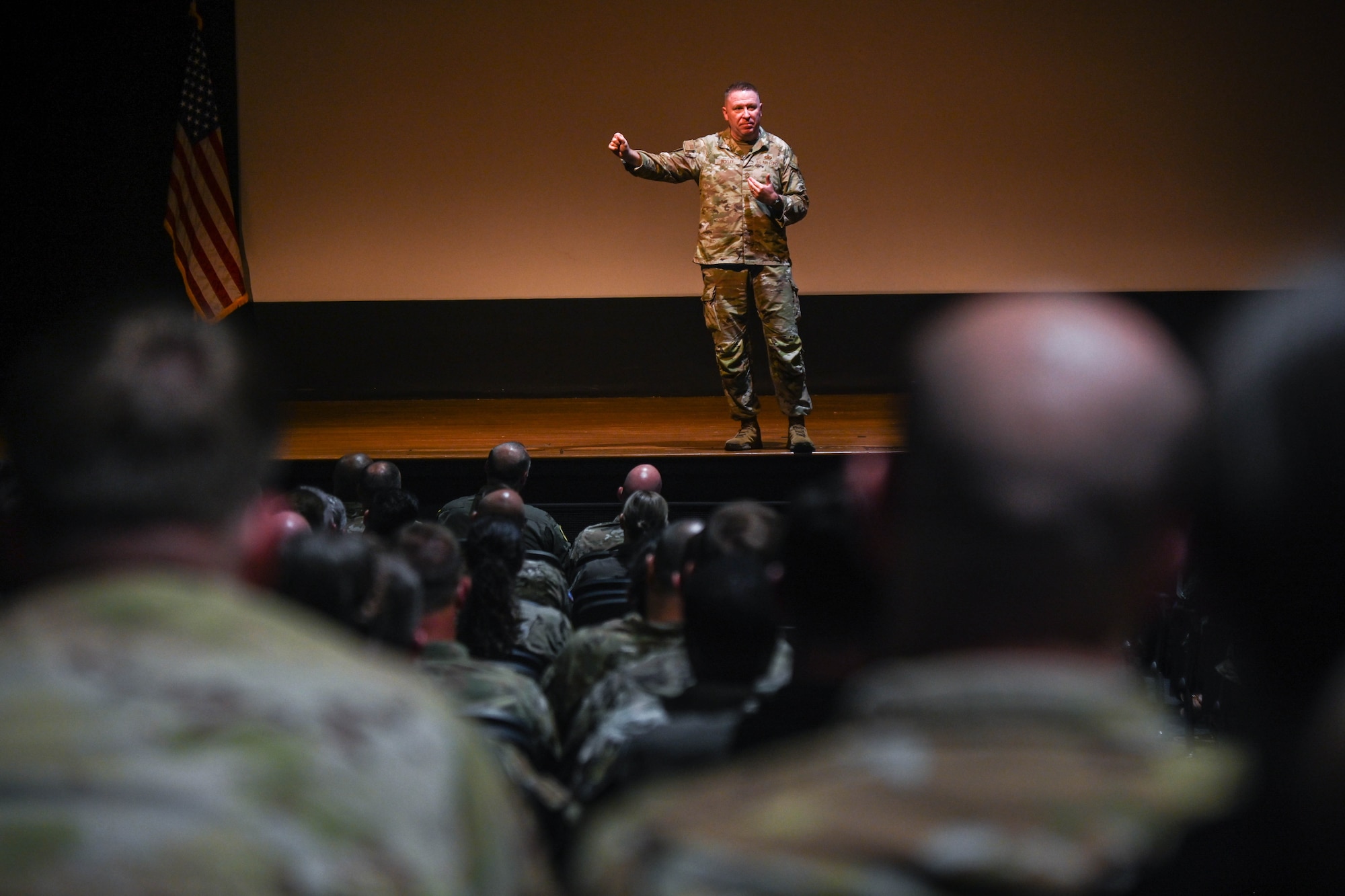 A service member speaks during an all-call.