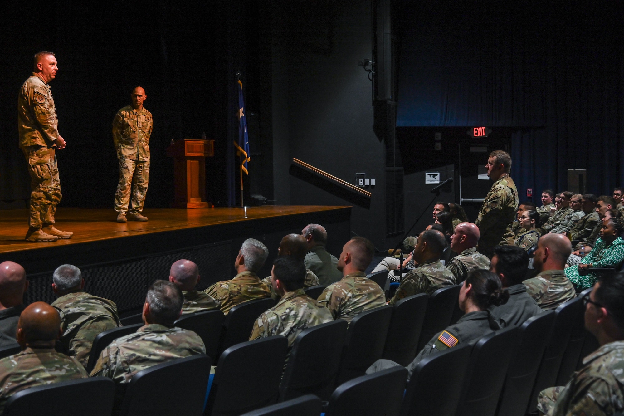A service member asks a question at an all-call.