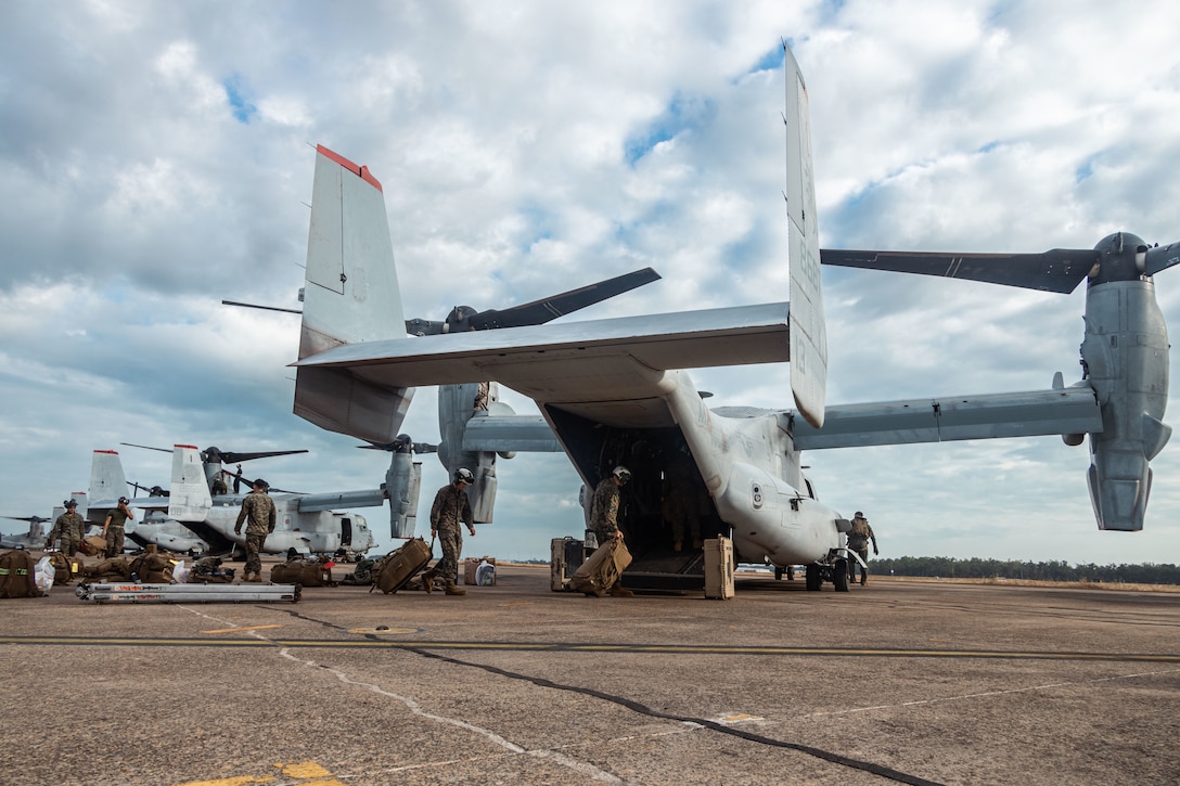 U.S. Marines with Marine Rotational Force – Darwin 25.3, load packs onto a MV-22B Osprey assigned to Marine Medium Tiltrotor Squadron (VMM) 363, MRF-D 25.3, at Royal Australian Air Force Base, Darwin, Australia, July 26, 2025. At the request of the government of the Philippines, U.S. Marines with the MRF-D 25.3 Marine Air-Ground Task Force are working alongside the Armed Forces of the Philippines to provide urgent lifesaving support to communities affected by consecutive storms and the southwest monsoon. The forward presence and ready posture of United States Indo-Pacific Command in the region facilitates rapid and effective response to crisis, demonstrating the U.S.’s commitment to allies and partners during times of need. (U.S. Marine Corps photo by Cpl. Anita Ramos)