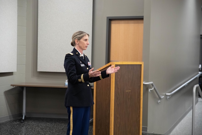 Col. Elizabeth Murphy speaks to family, friends and fellow Soldiers during a promotion ceremony at the Wellman Auditorium at Boone National Guard Center in Frankfort, Jul 22, 2025. Murphy has served since 1997, most recently with the Office of Special Victims’ Counsel. (U.S. Army photo by Milt Spalding)