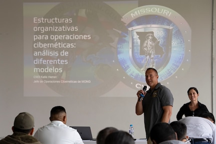 U.S. Missouri National Guard Maj. Jonathan Holem, the director of the Missouri State Partnership Program, speaks during a cybersecurity subject matter expert exchange with local government members in Panama City, Panama, July 22, 2025. The Missouri National Guard has formally been a part of the state partnership program with Panama since 1996, regularly partnering to exchange knowledge and conducting engagements to further build relations. (U.S. Air Force photo by Tech. Sgt. Kaylee Clark)