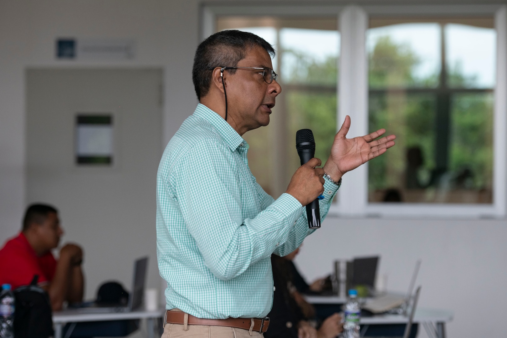 A representative from the Panama Canal Authority asks a question during a cybersecurity subject matter expert exchange between local government members and the U.S. Missouri National Guard in Panama City, Panama, July 22, 2025. The engagement focused on building shared procedures, improving Panama’s ability to defend critical infrastructure, and preparing both nations for participation in the upcoming multinational exercise PANAMAX. (U.S. Air Force photo by Senior Airman Julia Lebens)