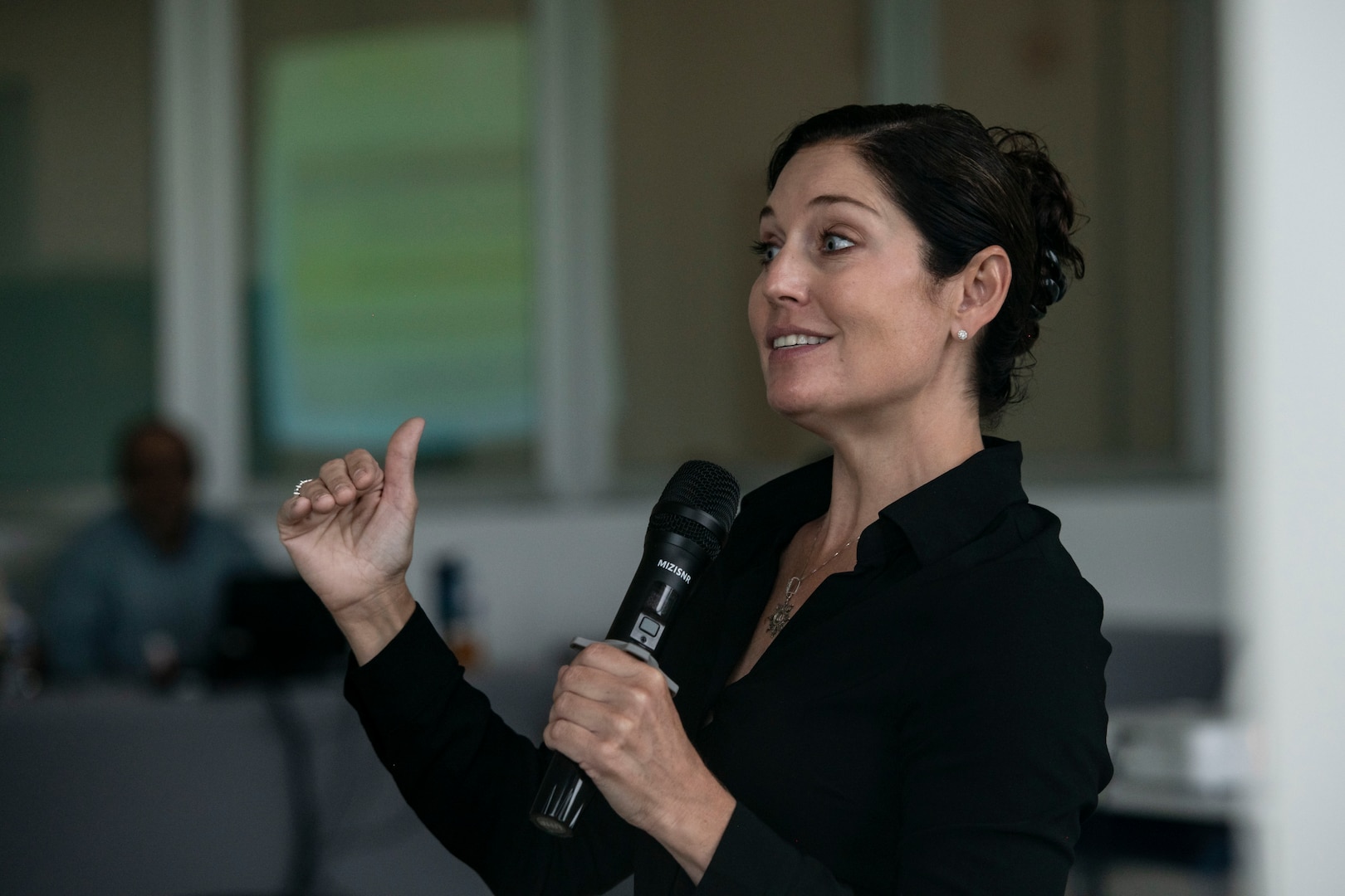 U.S. Missouri National Guard Chief Warrant Officer 3 Katie Herrel, the cyber operations chief for the Missouri National Guard, answers a question during a cybersecurity subject matter expert exchange with local government members in Panama City, Panama, July 22, 2025. The engagement focused on building shared procedures, improving Panama’s ability to defend critical infrastructure, and preparing both nations for participation in the upcoming multinational exercise PANAMAX. (U.S. Air Force photo by Senior Airman Julia Lebens)