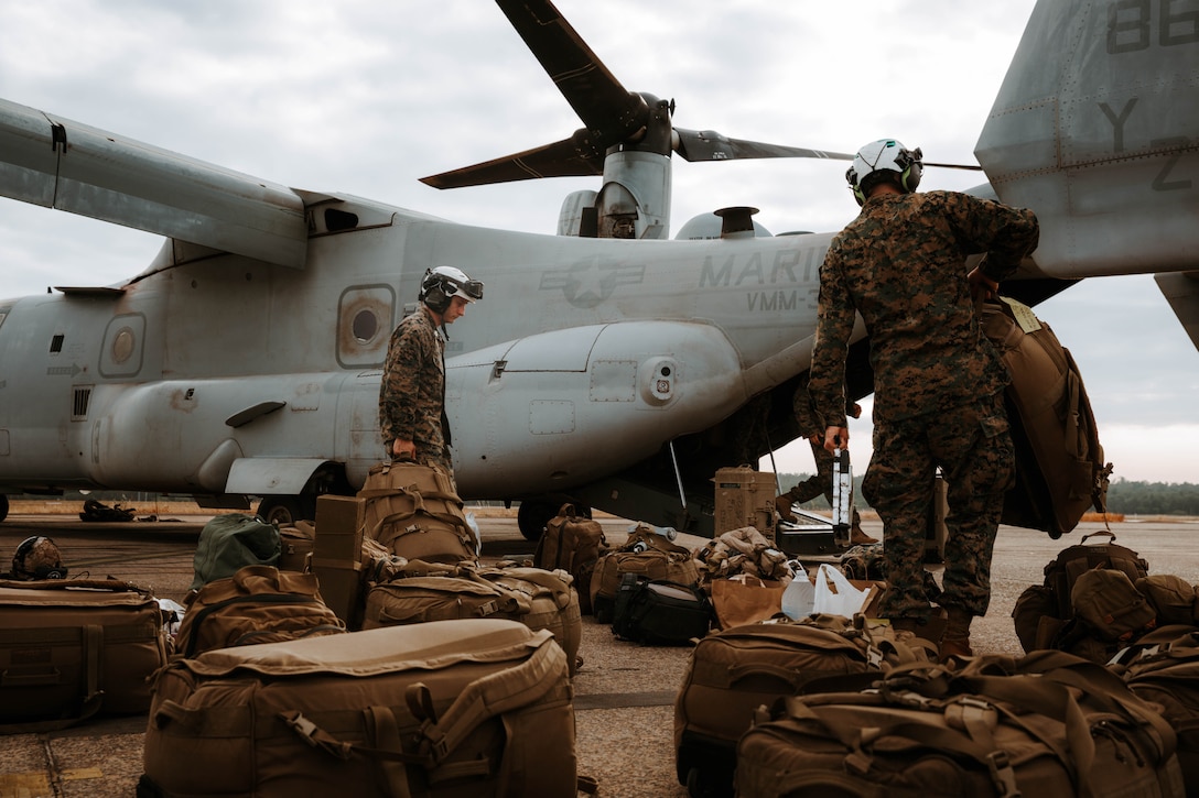 U.S. Marines with Marine Medium Tiltrotor Squadron (VMM) 363, Marine Rotational Force – Darwin 25.3, begin loading bags onto an MV-22B Osprey before departing to the Philippines, at Royal Australian Air Force Base Darwin, Australia, July 26, 2025. At the request of the government of the Philippines, U.S. Marines with the MRF-D 25.3 Marine Air-Ground Task Force are working alongside the Armed Forces of the Philippines to provide urgent lifesaving support to communities affected by consecutive storms and the southwest monsoon. The forward presence and ready posture of United States Indo-Pacific Command in the region facilitates rapid and effective response to crisis, demonstrating the U.S.’s commitment to allies and partners during times of need. MRF-D is an annual six-month rotational deployment to enhance interoperability with the Australian Defence Force and allies and partners and provide a forward postured crisis response force in the Indo-Pacific.  (U.S. Marine Corps photo by Sgt. Brian A. Stippey)