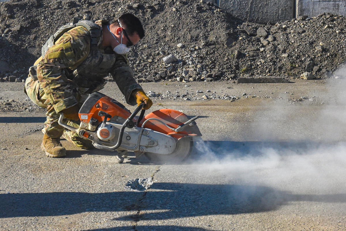 U.S. Air Force Staff Sgt. Lawrence Jenkins, Julius A. Kolb Airman Leadership School class 25-E student, conducts spall repair training at Joint Base Lewis-McChord, Washington, July 8, 2025.