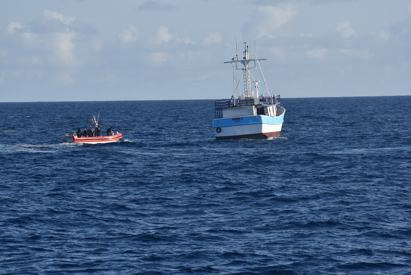 Coast Guard cutter Joseph Doyle and a Station San Juan boat crew assisted four mariners aboard the disabled vessel Sueño I off Carolina, Puerto Rico, July 29, 2025. The Coast Guard surface assets safely towed the vessel to Coast Guard Base San Juan, where the assisted mariners are conducting repairs. (U.S. Coast Guard photo)