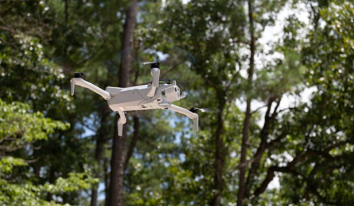 A drone flies in the sky.