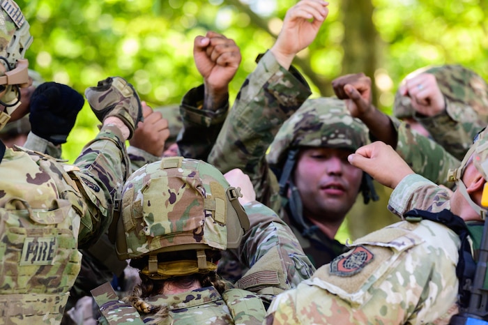 Service members cheer