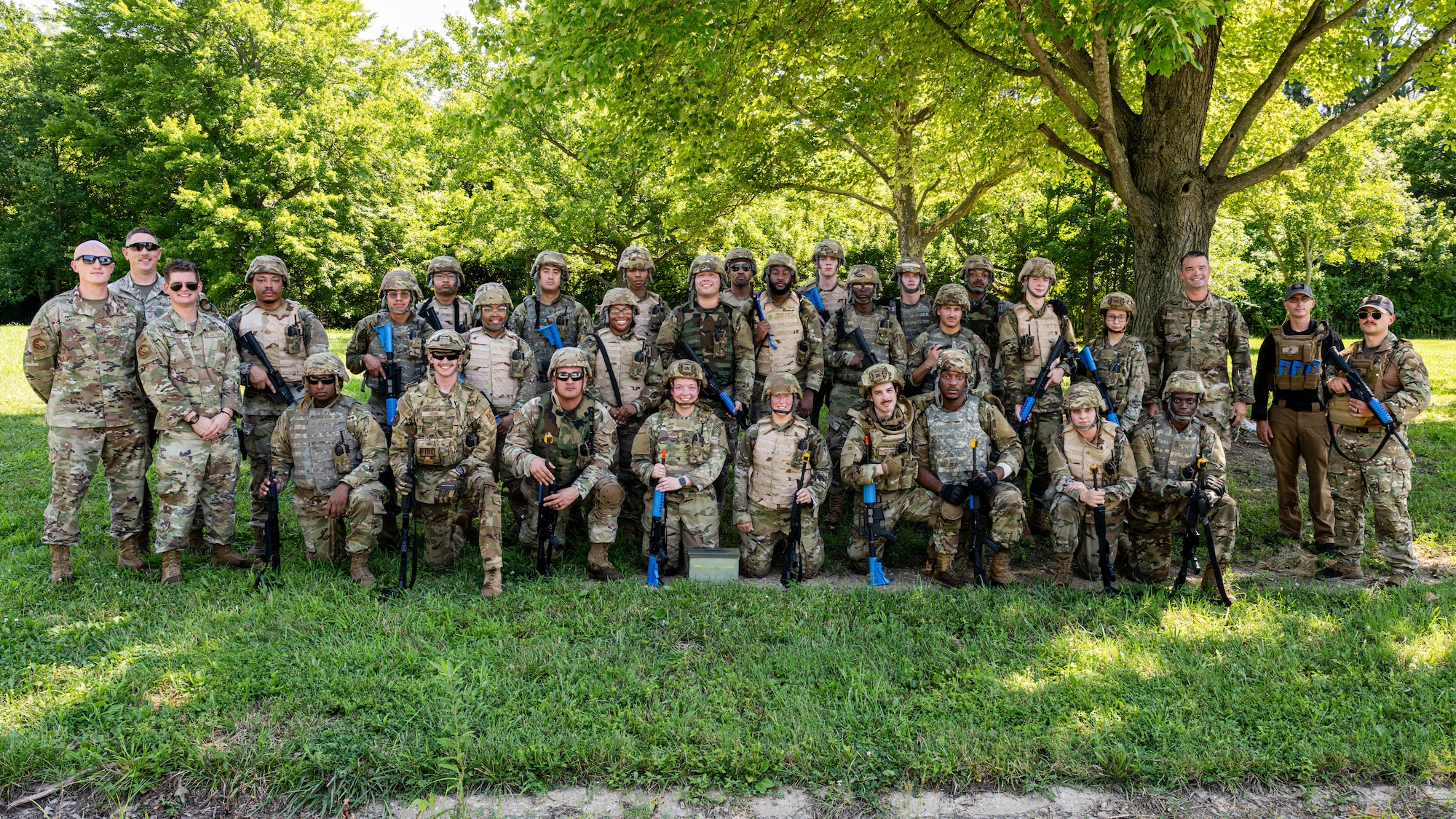 Airmen pose for a photo.