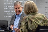 Stan Soderstrom, Civilian Aide to the Secretary of the Army, talks with Col. Michelle M. Williams, U.S. Army Financial Management Command commander, during a visit to USAFMCOM at the Maj. Gen. Emmett J. Bean Federal Center in Indianapolis Feb. 11, 2025. Soderstrom met with Williams to learn more about USAFMCOM and offer his support to the command. (U.S. Army photo by Mark R. W. Orders-Woempner)