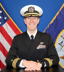 Cmdr. DAVID A. COOK