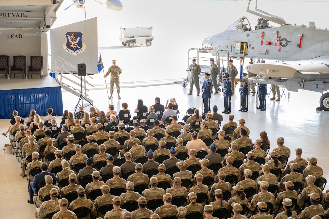 An overall shot of an audience at a change of command ceremony.