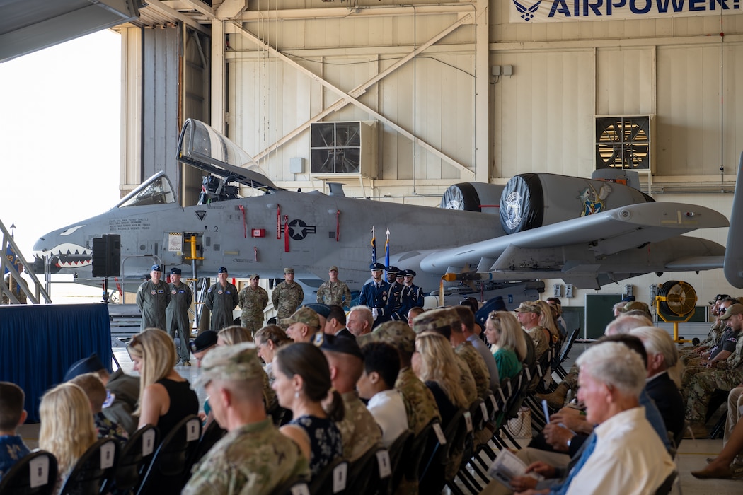 An audience sitting during a change of command ceremony.