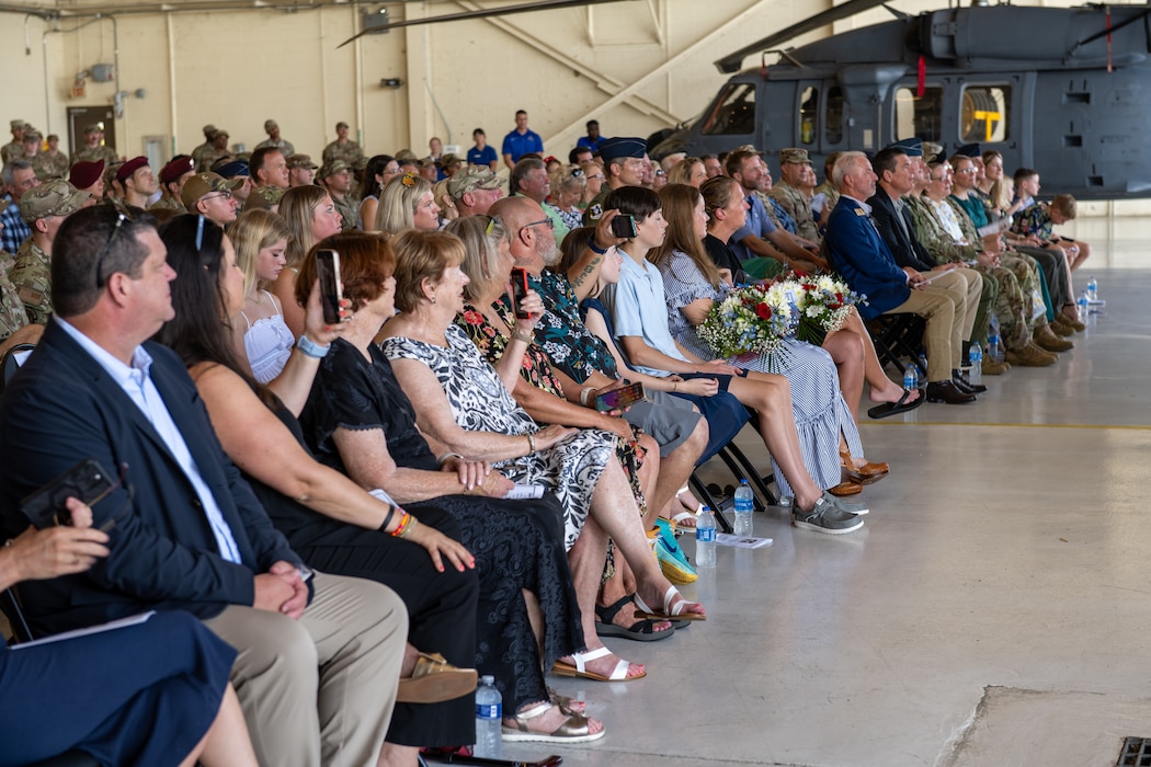 An audience sitting down.